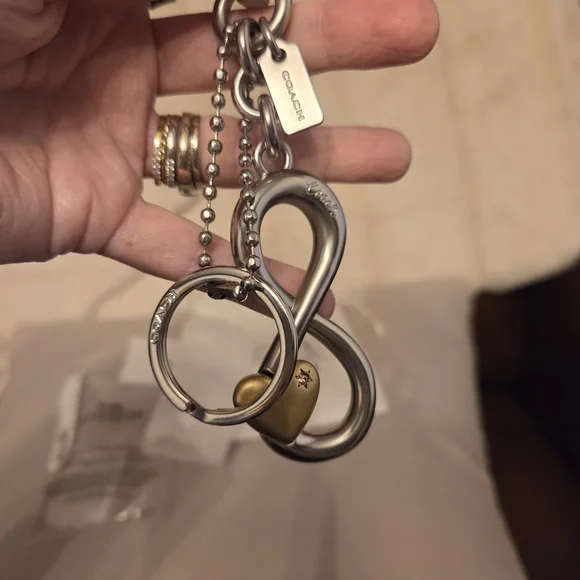 Coach | The Summer I Turned Pretty | Infinity Silver and Gold Keychain Bag Charm - Picture 11 of 16